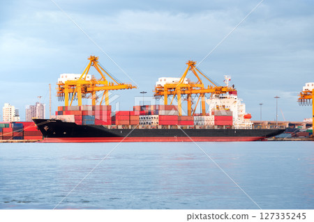 Cargo ship at port in Bangkok city, Thailand. Cargo ship at port in Bangkok city, Thailand. 127335245