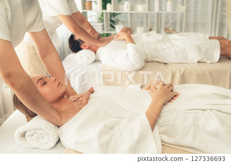Caucasian couple customer enjoying relaxing anti-stress massage. Quiescent 127336693
