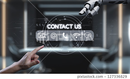 Futuristic Technology Interaction with Hand and Robot Arm for Contact Us Interface in Modern Office Setting. Auvana Futuristic Technology Interaction with Hand and Robot Arm for Contact Us Interface in Modern Office Setting. Auvana 127336829