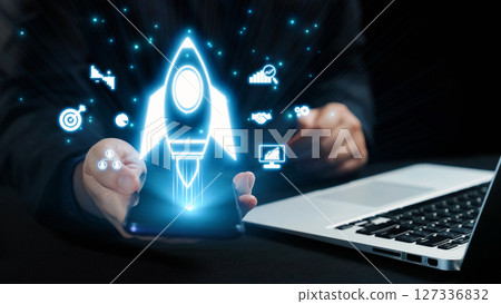 Digital Innovation and Technology Concept with Rocket Launch Symbolizing Business Growth and Startup Success in Modern Workspace. Qubit Digital Innovation and Technology Concept with Rocket Launch Symbolizing Business Growth and Startup Success in Modern Workspace. Qubit 127336832