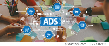 Creative teamwork session focused on advertising strategies, digital marketing tools, brainstorming concepts with colorful notes and hands collaborating. Amity 127336995