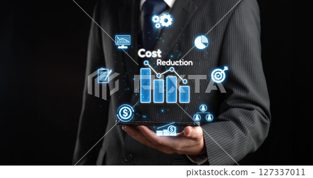 Cost reduction, cost saving concept shown by digital graphic EIDE overlays 127337011