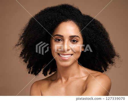 Hair care, afro beauty and portrait of black woman with clean shampoo hair, cosmetics and happy with skincare glow. Salon spa, healthcare and face of African model with makeup and healthy hair growth Hair care, afro beauty and portrait of black woman with clean shampoo hair, cosmetics and happy with skincare glow. Salon spa, healthcare and face of African model with makeup and healthy hair growth 127339070