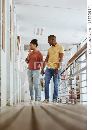 Black couple, bonding or love in animal shelter, pet kennel or foster care clinic in homeless community support or volunteer work. Woman, man or holding hands, dog adoption shop or thinking of rescue Black couple, bonding or love in animal shelter, pet kennel or foster care clinic in homeless community support or volunteer work. Woman, man or holding hands, dog adoption shop or thinking of rescue 127339144