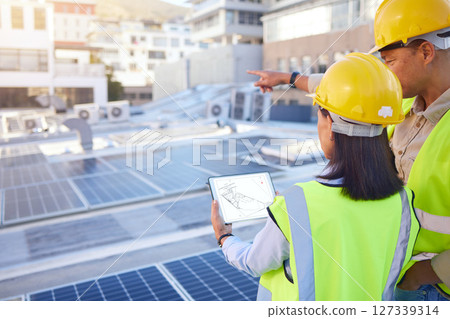 Engineer, back or woman with man, solar energy or sustainable power inspection. Technician, male or female for panels maintenance, eco friendly construction or agriculture for alternative electricity Engineer, back or woman with man, solar energy or sustainable power inspection. Technician, male or female for panels maintenance, eco friendly construction or agriculture for alternative electricity 127339314