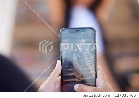 Hands, phone and picture of woman with shopping bags shopping in the city. Discount deals, sales or pov of friend taking photo of female by stairs at mall with mobile smartphone for social media post Hands, phone and picture of woman with shopping bags shopping in the city. Discount deals, sales or pov of friend taking photo of female by stairs at mall with mobile smartphone for social media post 127339409
