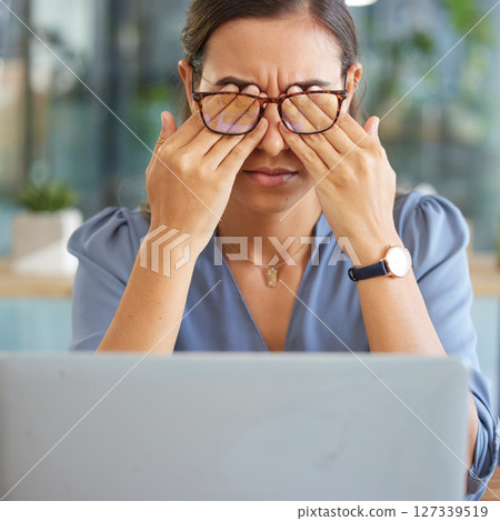 Tired corporate woman, laptop and eye pain with hands, glasses and stress at desk in finance office. Burnout, executive leader and headache by computer with mental health, problem or anxiety in Dubai 127339519