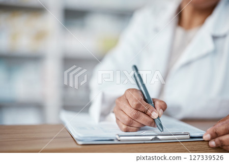 Woman, hands or pharmacy clipboard writing for medical stock check, medicine product research or pills prescription order. Zoom, pharmacist or healthcare worker with paper documents in retail store Woman, hands or pharmacy clipboard writing for medical stock check, medicine product research or pills prescription order. Zoom, pharmacist or healthcare worker with paper documents in retail store 127339526