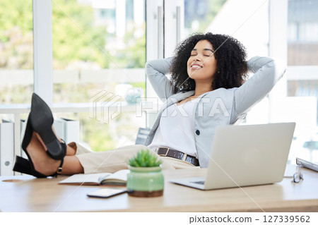 Business woman, feet up and relax with laptop on office desk while happy about productivity, success and career choice as boss, leader or manager. Black female entrepreneur done and finish with work 127339562