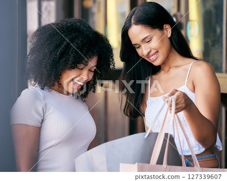 Happy customer, women and friends check shopping bags for luxury fashion, discount product and sales promotion from retail therapy. Two girls excited at choice from shopping mall customer experience Happy customer, women and friends check shopping bags for luxury fashion, discount product and sales promotion from retail therapy. Two girls excited at choice from shopping mall customer experience 127339607