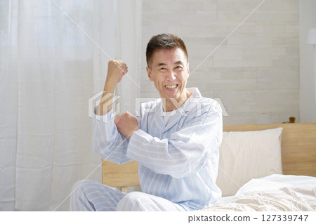 A cheerful middle-aged man who woke up A cheerful middle-aged man who woke up 127339747