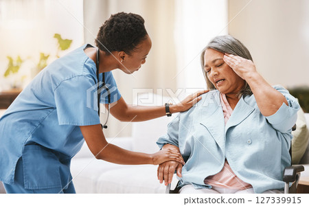 Nurse, senior woman and headache with rehabilitation, physiotherapy and help with disability. Black woman, healthcare expert and old woman for injury, wellness and physical therapy for helping hand Nurse, senior woman and headache with rehabilitation, physiotherapy and help with disability. Black woman, healthcare expert and old woman for injury, wellness and physical therapy for helping hand 127339915