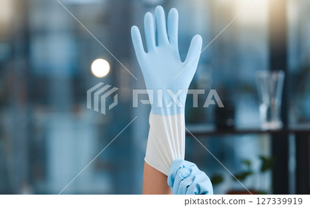 Hands, cleaning gloves and woman in home getting ready for hygiene at night. Spring cleaning, cleaning service and maid, worker or cleaner preparing to start washing or disinfection in dark house Hands, cleaning gloves and woman in home getting ready for hygiene at night. Spring cleaning, cleaning service and maid, worker or cleaner preparing to start washing or disinfection in dark house 127339919