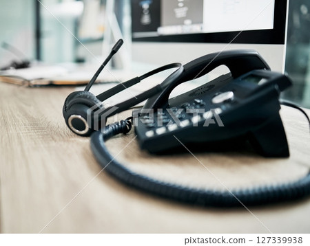 Telephone, contact us with call center, communication and headphone with microphone on work desk. Contact center, customer support and phone, consulting and customer service with callcenter voip. Telephone, contact us with call center, communication and headphone with microphone on work desk. Contact center, customer support and phone, consulting and customer service with callcenter voip. 127339938