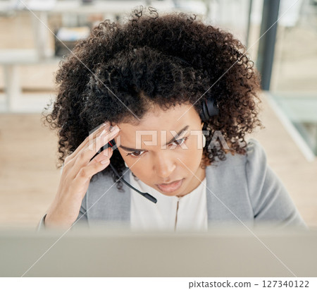 Call center, black woman with headache and stress, burnout with contact us and mistake with customer feedback. Depression, job mental health with customer service fail and CRM problem with employee. 127340122