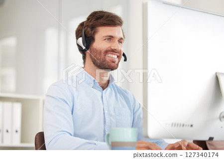 Call center, computer and businessman with smile for virtual support, communication and software help in information technology office. Happy corporate worker with technology for telemarketing sales 127340174