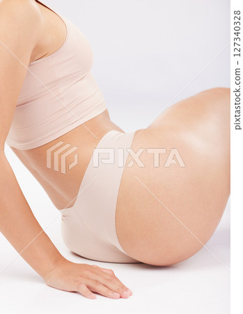 Body, health and woman with beauty and butt, fitness and weightloss with diet motivation, cellulite and skincare against studio background. Liposuction, underwear and skin with wellness and self love Body, health and woman with beauty and butt, fitness and weightloss with diet motivation, cellulite and skincare against studio background. Liposuction, underwear and skin with wellness and self love 127340328