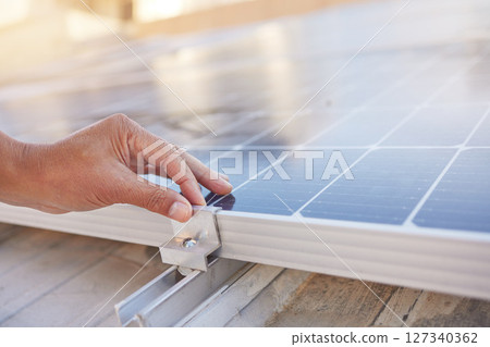 Engineer, hands and solar panel with maintenance, working and industry for renewable energy in sunshine. Working, solar energy and sustainability for future, clean power and photovoltaic electricity Engineer, hands and solar panel with maintenance, working and industry for renewable energy in sunshine. Working, solar energy and sustainability for future, clean power and photovoltaic electricity 127340362