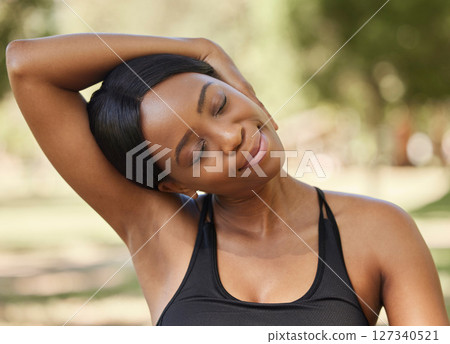 Black woman, fitness or neck stretching in nature park for healthcare wellness, relax exercise or workout training. Sports athlete, person or runner in warm up for muscle pain relief in garden field 127340521