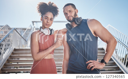 Black couple, city stairs portrait and fitness with headphones, music and motivation at outdoor workout. Exercise couple, teamwork and support for health, urban training and development of wellness 127340565