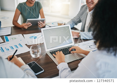 Laptop, teamwork and business people with documents in meeting. Mockup, planning and collaboration of group with statistics, analytics and graphs for sales targets, advertising or marketing strategy. 127340571