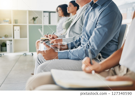 Business people, hands and writing notes in training, office workshop or education for target growth, planning goals or team work mission. Men, women and presentation audience with books in coaching 127340590