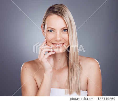 Face portrait, beauty skincare and woman in studio isolated on a gray background. Makeup, natural cosmetics and happy female model with healthy, glowing and flawless skin after spa facial treatment 127340869