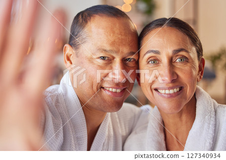 Selfie, spa and relax with a mature couple posing for a photograph in a salon of wellness center together. Face, portrait and massage with a man and woman taking a picture in a luxury resort Selfie, spa and relax with a mature couple posing for a photograph in a salon of wellness center together. Face, portrait and massage with a man and woman taking a picture in a luxury resort 127340934