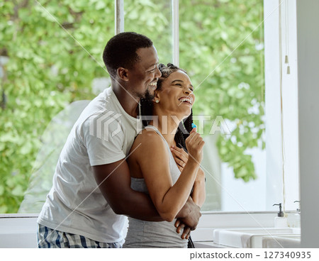 Love, black couple and hug in bathroom, smile and bonding together for relationship, dating and weekend. Romance, man and woman in house, embrace and loving for marriage, relax and quality time Love, black couple and hug in bathroom, smile and bonding together for relationship, dating and weekend. Romance, man and woman in house, embrace and loving for marriage, relax and quality time 127340935