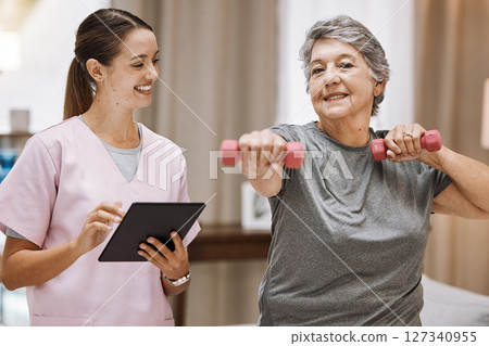Nurse with tablet, old woman in nursing home and physical therapy fitness with dumbbell, healthcare and digital checklist for wellness. Health, retirement care and exercise with muscle training. 127340955