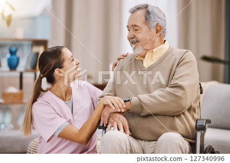 Healthcare, disability and man in wheelchair with nurse in retirement or nursing home with smile on face. Senior care, happy disabled grandpa and woman caregiver in living room at home in Mexico Healthcare, disability and man in wheelchair with nurse in retirement or nursing home with smile on face. Senior care, happy disabled grandpa and woman caregiver in living room at home in Mexico 127340996