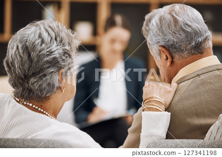 Counseling, senior couple and psychology consultation with therapist for advice, help or support. Back view, old man and elderly woman talking to psychologist, therapy service and marriage consulting Counseling, senior couple and psychology consultation with therapist for advice, help or support. Back view, old man and elderly woman talking to psychologist, therapy service and marriage consulting 127341198