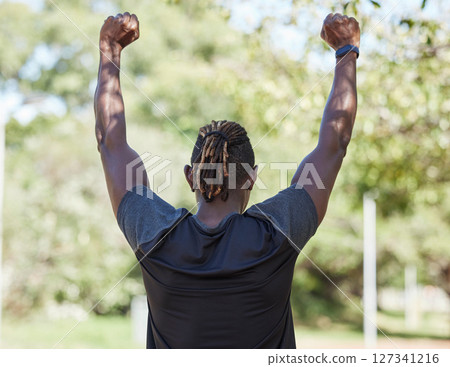 Winner, fitness and black man running outdoor with success, exercise in park with training and active lifestyle. Runner back view, freedom with workout and sports motivation, celebration, win and run Winner, fitness and black man running outdoor with success, exercise in park with training and active lifestyle. Runner back view, freedom with workout and sports motivation, celebration, win and run 127341216