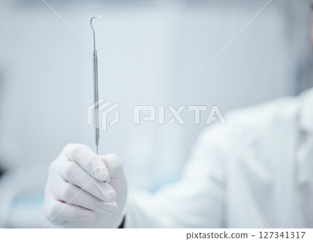 Dental tools, dentist hand and teeth health mockup, mouth care with oral hygienist and surgery for tooth. Teeth whitening equipment, metal and medical with oral healthcare and dentistry clinic 127341317