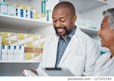 Pharmacy, doctors or pharmacist with medicine for stock, inventory or supplements products check. Tablet, teamwork or happy senior healthcare people working or speaking of pills or medical drugs 127341399