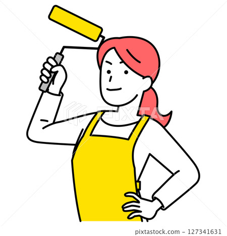 A woman in an apron holding a paint roller 127341631