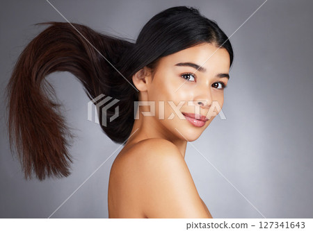 Woman, hair care and beauty in studio portrait for strong, healthy natural shine and wellness by background. Model, hair glow and cosmetic self care for health, self love and confidence by backdrop Woman, hair care and beauty in studio portrait for strong, healthy natural shine and wellness by background. Model, hair glow and cosmetic self care for health, self love and confidence by backdrop 127341643