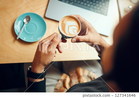 Coffee cup, man hands and laptop with remote work, planning and wifi internet in retail, business or restaurant marketing background. Coffee shop, cafe and creative table top with hand holding drink 127341646