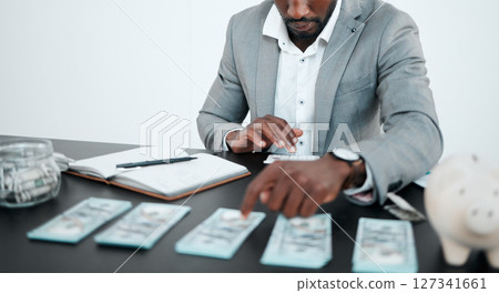 Accounting, money and businessman planning budget, finance investment and audit on a calculator. Cash, profit and accountant with inspection of income, financial management and saving 127341661