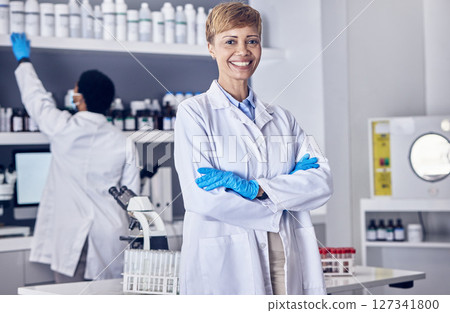 Senior scientist, woman and portrait with smile in laboratory, science and medical innovation with research study. Pharmaceutical development, pharmacy and chemistry, female phd doctor and medicine. 127341800