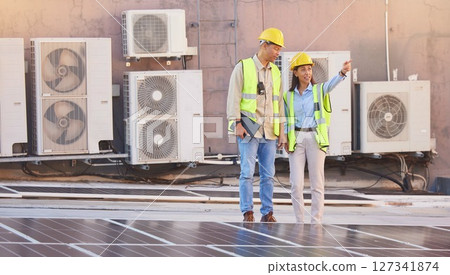 Solar panels, roof or engineering team planning photovoltaic construction for renewable energy development. Solar energy, innovation or engineers working on an industrial building or grid project 127341874