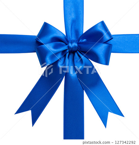 Festive blue ribbon bow, perfect for holiday gifts or celebration decorations, isolated on white. 127342292