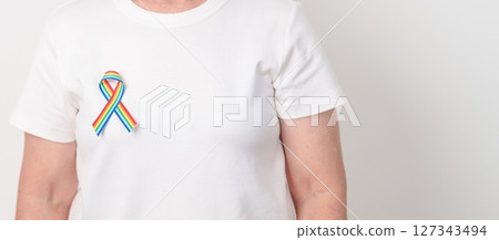 Elderly with LGBTQ Rainbow ribbon for concept of June Pride month, April Autism Awareness, All cancer Awareness, February World Cancer day, October World Hospice and Palliative care day and Survivor Elderly with LGBTQ Rainbow ribbon for concept of June Pride month, April Autism Awareness, All cancer Awareness, February World Cancer day, October World Hospice and Palliative care day and Survivor 127343494