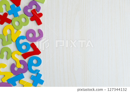 Colorful Numbers and Letters on Wooden Table with Copy Space Colorful Numbers and Letters on Wooden Table with Copy Space 127344132