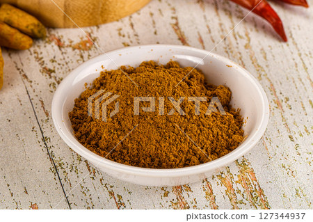 Indian cuisine - curry powder for culinary 127344937