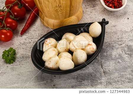 Mozzarella balls cheese in the bowl 127344983