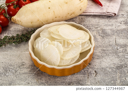 Sliced white daikon radish in the bowl Sliced white daikon radish in the bowl 127344987