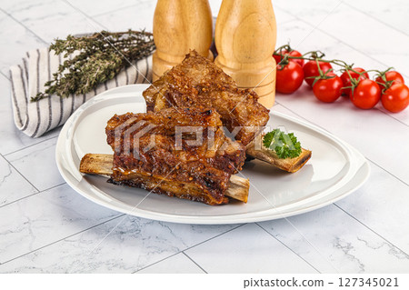 Baked beef ribs with marinade Baked beef ribs with marinade 127345021