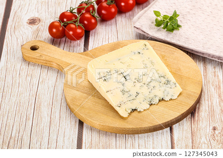 Blue cheese with mold over board Blue cheese with mold over board 127345043