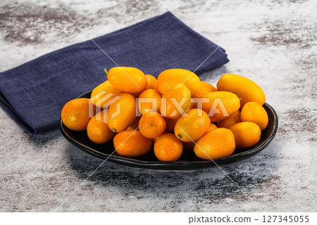 Sweet juicy tropical fruit kumquat 127345055
